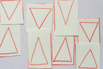 paper tiles with triangles on textured paper