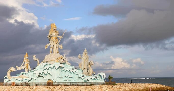 Statue of Varuna in Pantai Jerman Beach in Kuta, Bali Island, Indonesia 