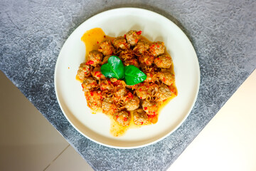 Sambal Goreng Kreni, an Indonesian dish. Meatballs cooked with spicy sauce