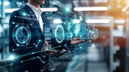 Fototapeta premium Businessman holding virtual technology interface panel