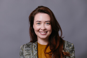 Confident woman looking at camera and smile