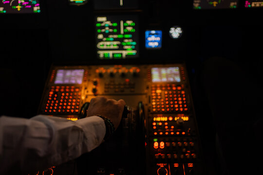 Hand Using An Aircraft Cabin, Flight Academy Simulator.