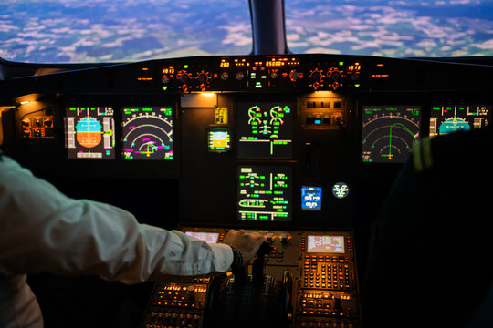 Hand Using An Aircraft Cabin, Flight Academy Simulator.
