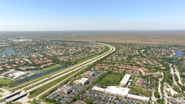 Aerial video upscale neighborhoods Heron Bay and Wyndham Lakes Coral Springs Florida USA