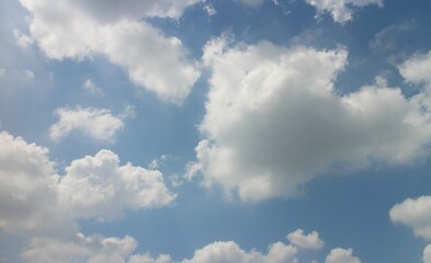 blue sky background with tiny clouds.