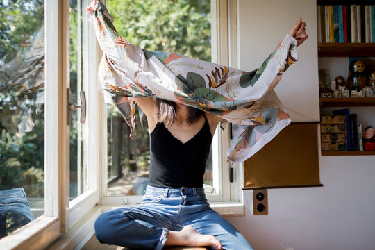 Young Woman gets dressed