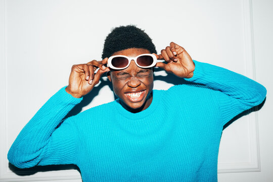 Man with sunglasses laughing