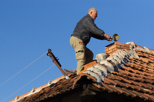 Man Building chimney