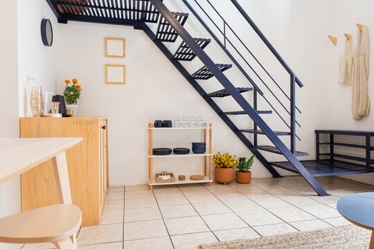 Beautiful apartment with stairs on the first floor and decorations