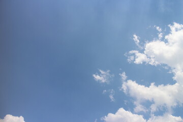Sun rays in the cloudy sky. Nature background.