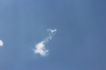 Sun rays in the cloudy sky. Nature background.