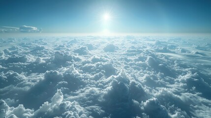 Beautiful aerial view above clouds with sun ray.