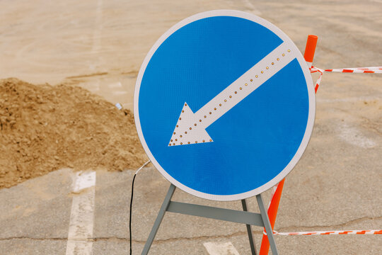 "This Way " road sign