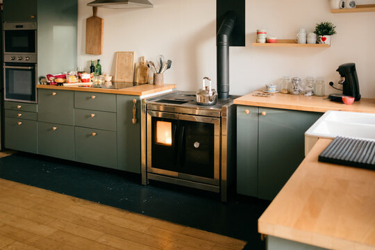 modern farmhouse kitchen with wood stove