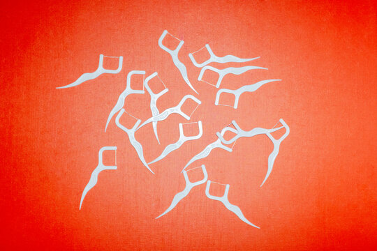 Contemporary photo of oral health dental floss and hard flashlight