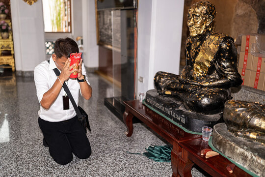 Man in Buddhist temple.