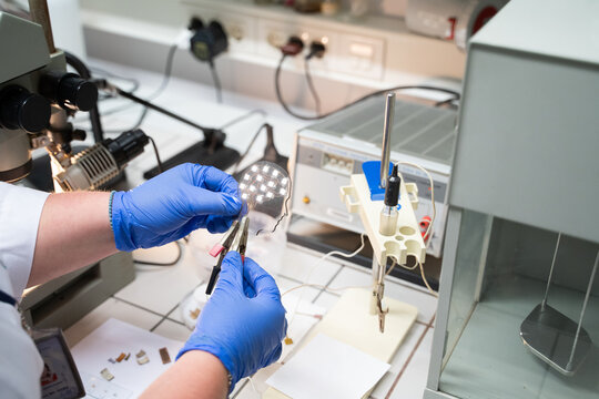 Anonymous Researcher Working With Catalysis Lab Experiment