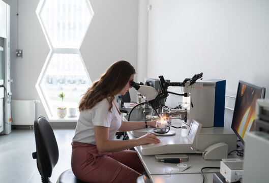 Scientist Working With High Resolution Microscope
