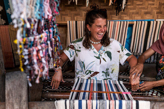 Tourist woman collaborating wth local retailers