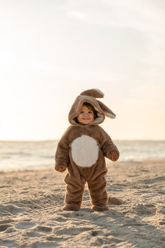 A little girl with a bunny onesie