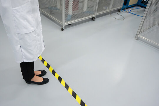 Anonymous Scientist Standing In The Lab