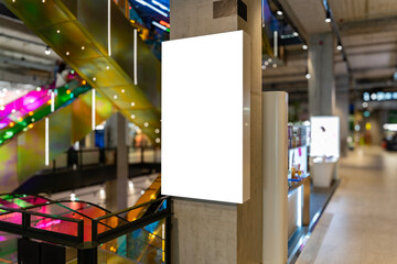 Mockup Blank space of tall lightbox advertising on the pole in shopping mall
