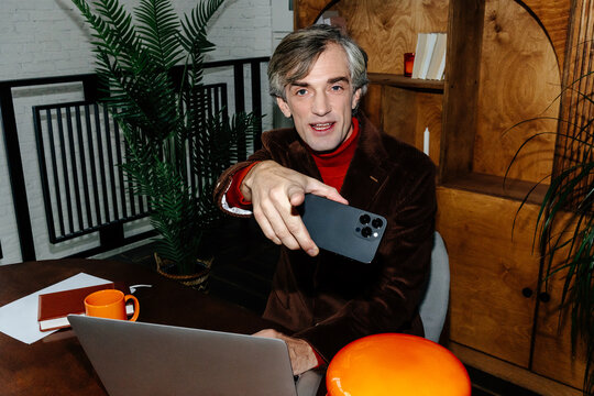 Expressive businessman in office