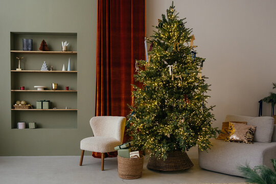 Decorated Christmas tree with glowing garland