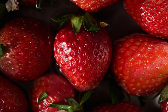 Organic strawberries on water