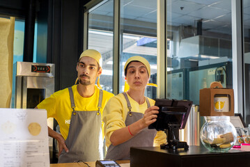Man and woman with mental health needs in a social cafe