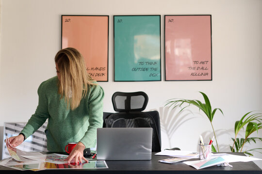 Creative Process: Woman Organizing Project Papers