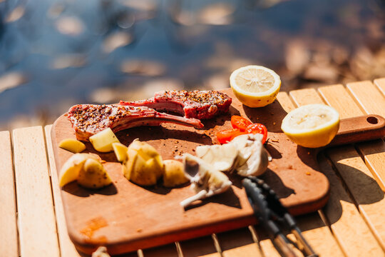 Prepped Lamb Chop and Vegetables on Board