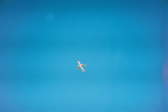 Airplane in a blue sky