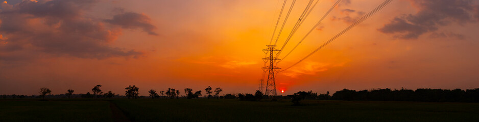 Panorama Silhouette street light post, electric pole and high voltage tower.High voltage...