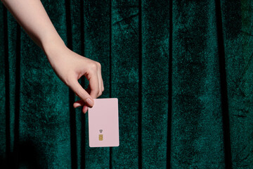 Credit card with chip in a female hand