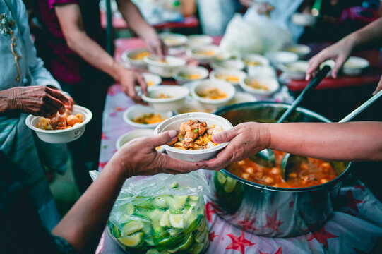 Help with feeding homeless people to alleviate hunger. poverty concept