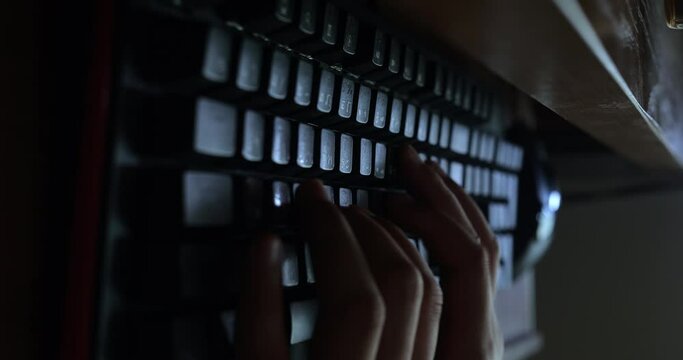 Woman typing on computer keyboard, Time lapse shot
