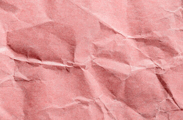 The crumpled paper is red. Beautiful background.
