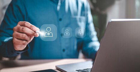 community, hr, employment, group, hiring, human, job, leader, leadership, organization. A man is drawing a person virtual screen. Concept of creativity to bring ideas to life through technology.