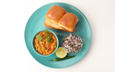Mumbai Style Pav bhaji is a fast food dish from India, consists of a thick vegetable curry served...
