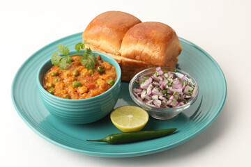 Mumbai Style Pav bhaji is a fast food dish from India, consists of a thick vegetable curry served...