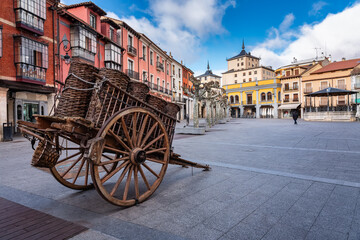 An old wooden cart that was used in the countryside in the town of Aranda de Duero, Burgos. - obrazy, fototapety, plakaty