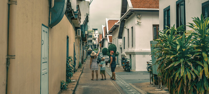 Family on the street in the old town of Bangkok