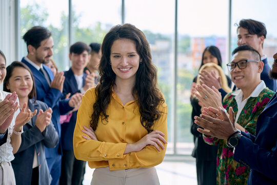 Celebrate scene with Businesswoman in yellow shirt and team crap hand and smile to happy for success promote.