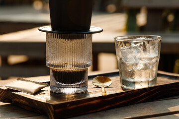 Coffee brewing. Traditional Vietnamese phin filtered coffee minimalist style copyspace