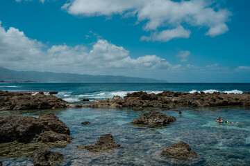 Shark’s Cove North Shore Oahu Hawaii.   reef deposits.  Snorkeling ( snorkelling ). A reef is a ridge or shoal of rock, coral or similar relatively stable material, 