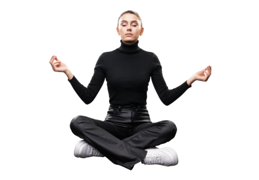 A young woman in black attire meditating with a serene emotion, isolated on a white background, depicting tranquility and focus - Powered by Adobe