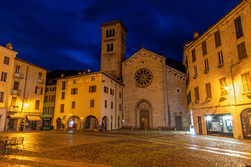 Como - The Basilica di San Fedele and square at dusk.