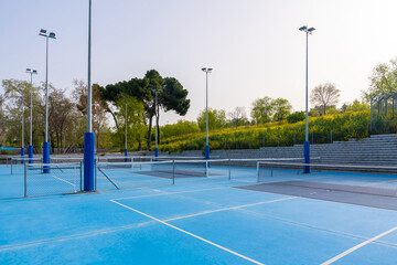 Empty venue with several pickleball outdoors courts