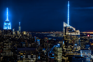 New York City Manhattan panorama aerial view at night with office building skyscrapers skyline 